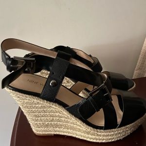 Black Nine West wedge sandal.